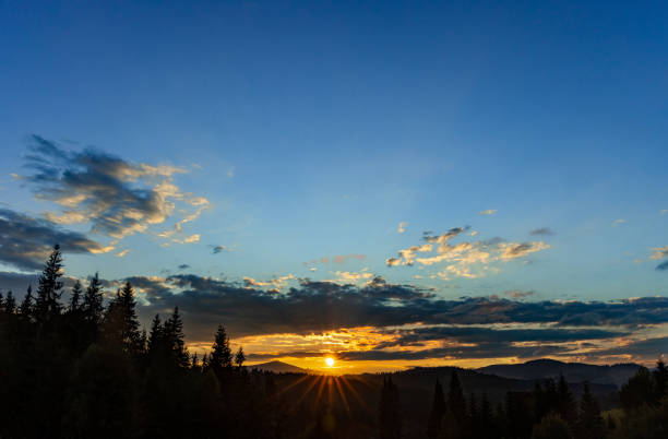 istock Beautiful landscape with clouds in the mountains at sunrise. 2173345244