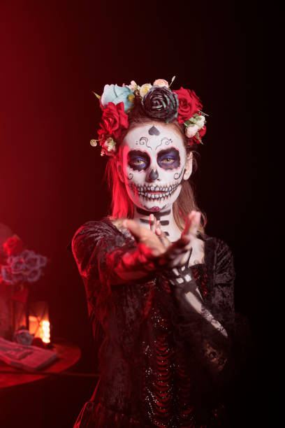 istock Lady doing seducing wooing gesturing during Mexican holiday of remembrance 2173347162
