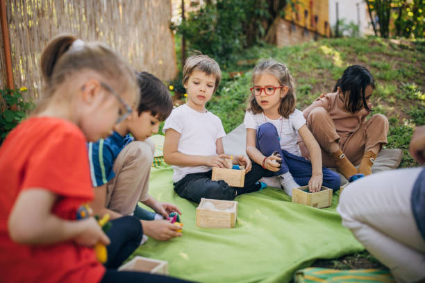 istock Group of kids with boxes participating in outdoor class 2173353091
