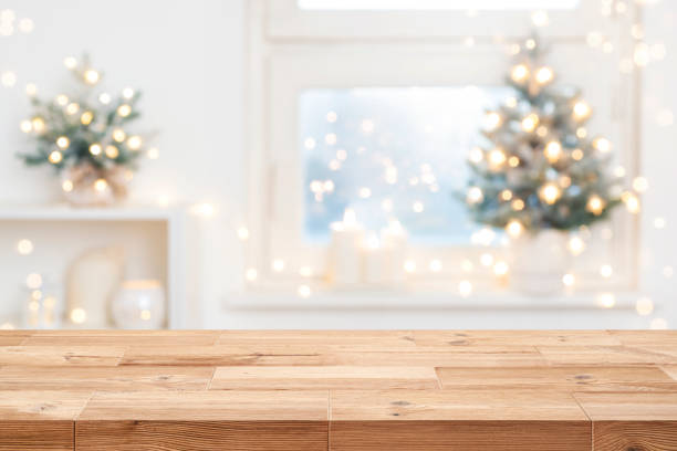 istock Christmas background table with copy space on blur decorated frosty window interior 2173356723