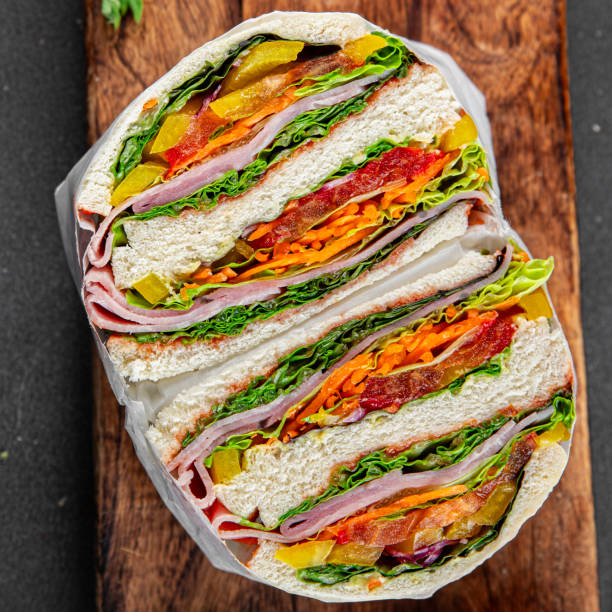 istock sandwich layers vegetables and ham meat spam fresh meal food snack on the table copy space food background rustic top view 2173358366
