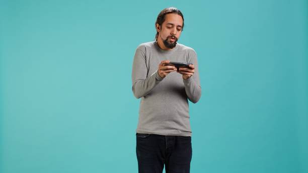 istock Gamer participates in gaming competition using mobile phone 2173359133
