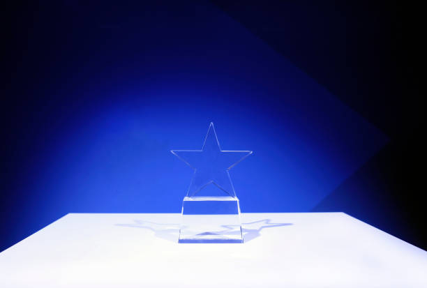 istock Award on a table with spotlights and copy space 2173363847