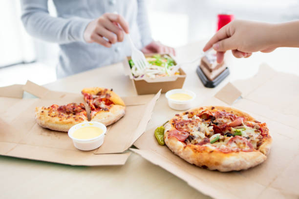istock Group of people eating pizza 2173363927