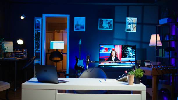 istock Streaming equipment in modern apartment illuminated with RGB lights at night 2173376321