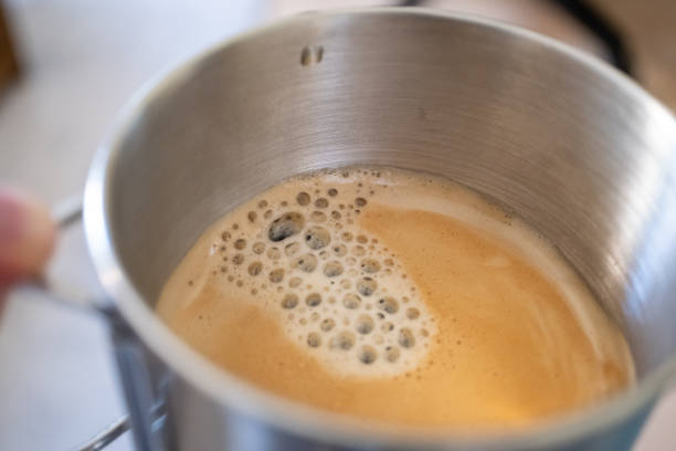 istock Making espresso lungo in a metal cup with a capsule coffee machine 2173377305