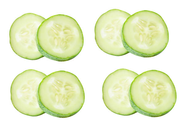 istock Top view set of fresh green cucumber slices in circle shape in stack isolated on white background with clipping path 2173378893