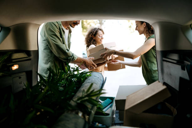 istock Taking moving box out of car 2173392801