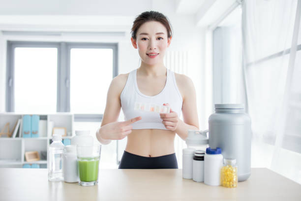 istock Woman preparing protein in kitchen 2173396436