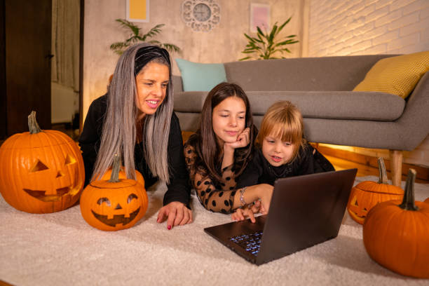 istock Family on video call for Halloween 2173414029