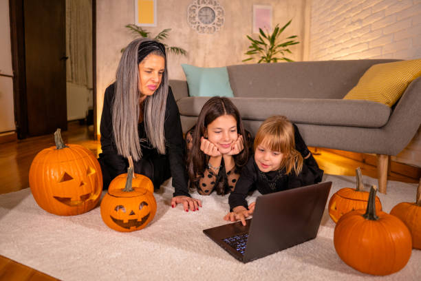 istock Family on video call for Halloween 2173414059