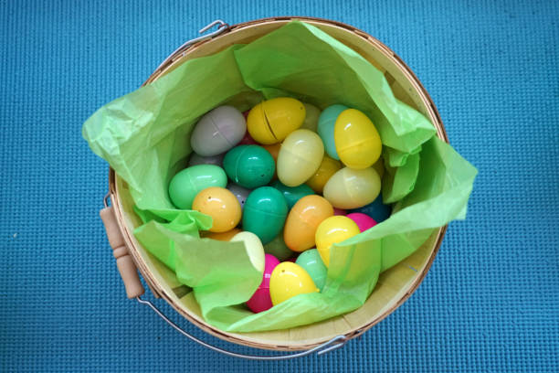 istock plastic toy Easter eggs and colorful containers for kids 2173421219