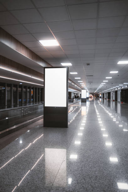Blank ad mockup in modern airport hall