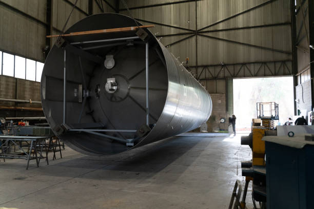 istock Large steel tank lying horizontally in a manufacturing facility 2173427022