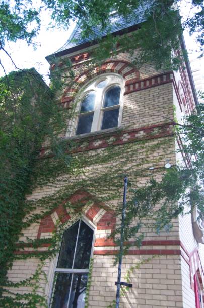 istock Historic brick building with ivy-covered facade 2173432397