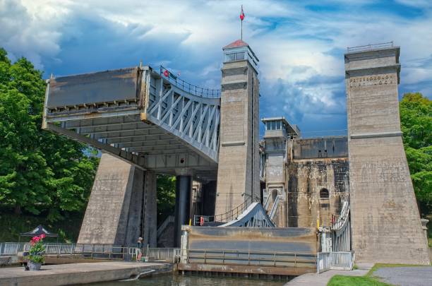 istock Hydraulic lift lock with raised platform and cloudy sky 2173432409