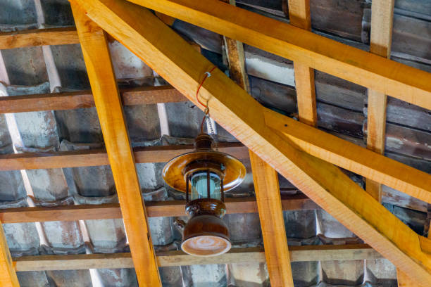 istock Lamps hanging at the roof with a tile background 2173435295