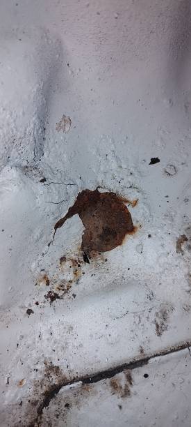 istock parts inside the car hood oxidized by sea spray rust 2173438396