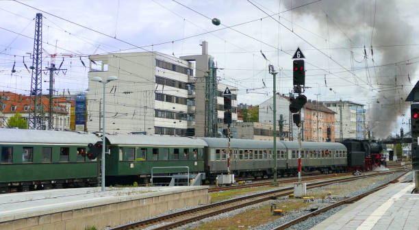 istock Historical steam train leaves the station. 2173438437