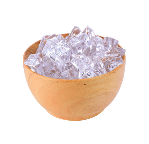 istock ice cubes in wooden bowl isolated on white background 2173438772