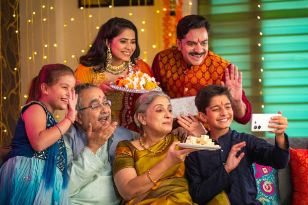 istock Happy multi-generation family taking selfie on sofa at home during Diwali 2173442066