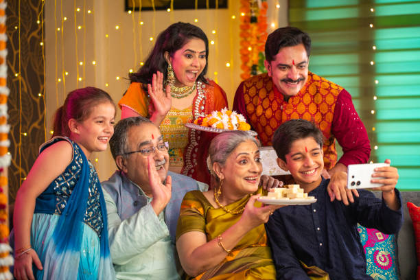 istock Happy multi-generation family taking selfie on sofa at home during Diwali 2173442092