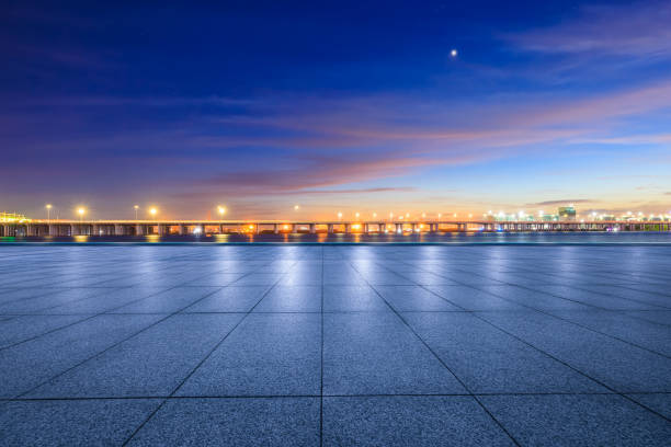 istock Empty square floor and beautiful sky clouds natural landscape at night 2173454774