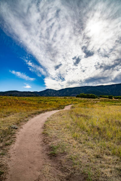 Open space land previously a ranch in the Rocky Mountains with hills, creeks and sandstone formations near Colorado Springs, Castle Rock, and Denver Colorado. This is western USA of North America.