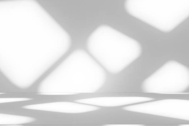 istock Studio style background wall decoration presentation uses white tones. with shadows cast from a nearby window, concept creating a decorative backdrop. 2173462797