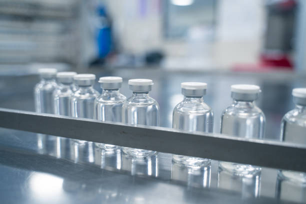 istock Bottles on a conveyor belt at a pharmaceutical bottle manufacturing plant 2173467683