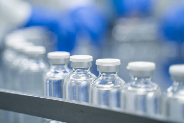 istock Bottles on a conveyor belt at a pharmaceutical bottle manufacturing plant 2173467706