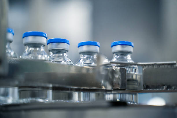 istock Bottles on a conveyor belt at a pharmaceutical bottle manufacturing plant 2173468030