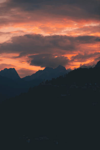 Moody sky over mountains in summer, Dolomites