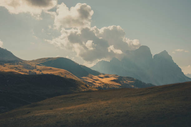 istock Morning light on mountains and meadow, Dolomites 2173471134