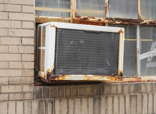 istock rustic old air conditioner installed on old wood wall building 2173474339