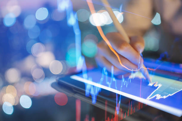 istock Investor with AI digital display of an automated trading interface, featuring AI algorithms and detailed financial graphs for optimized investments 2173477545