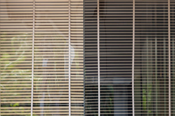 istock The window is covered with a wooden blinds 2173478749