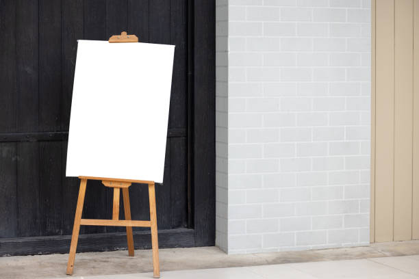 istock A white easel with a blank canvas on top of it 2173478757
