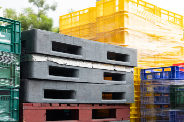 istock A stack of crates with a black and gray pallet on top 2173478758