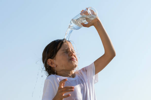 istock Little Girl Drinking Water 2173479605