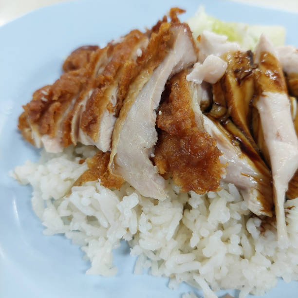 istock A dish of steamed rice with boiled and fried chicken 2173483011