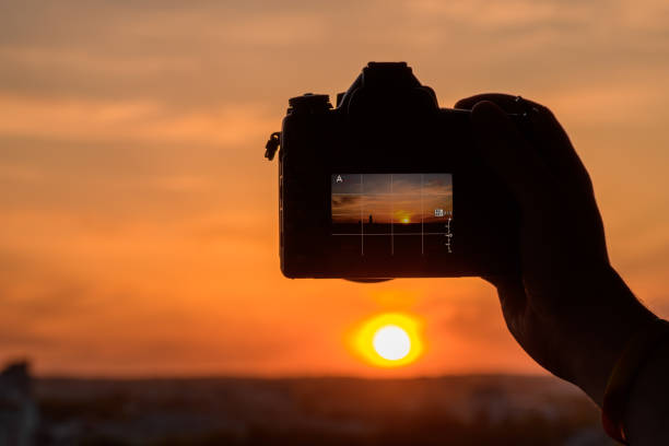 istock Take a picture of a sunset with a camera, live background 2173484395