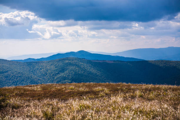 Bieszczady landscape on a sunny autumn morning. Połoniny typical of these mountains.