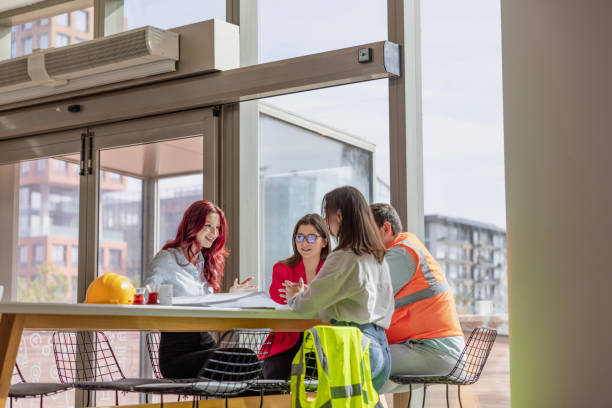 istock Manager and Creative Team Sitting and Meeting in a Modern and Bright Workspace Boardroom 2173493865