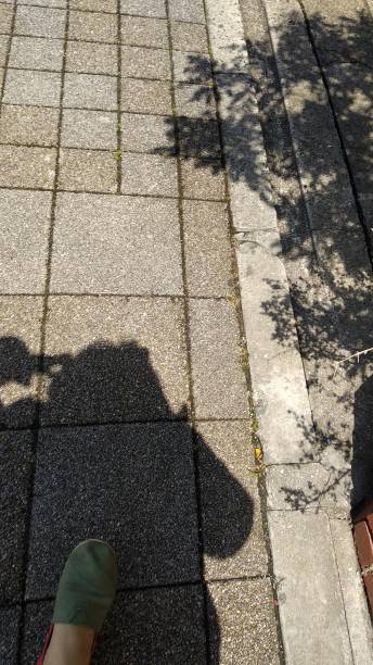 istock a man is walking in the street 2173497735