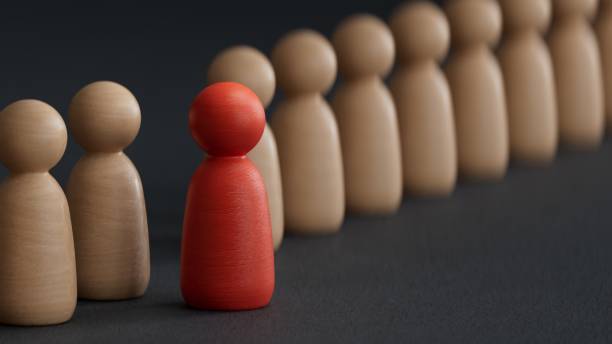 istock Stand out from the crowd. Individuality, originality and uniqueness.3D rendering on black background. 2173502049