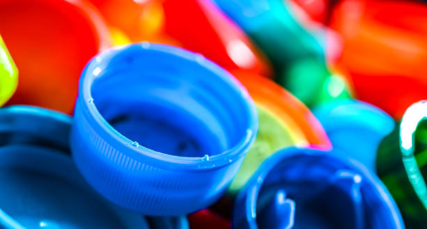 istock Different sorts of colorful plastic bottle caps. Recycling 2173516195