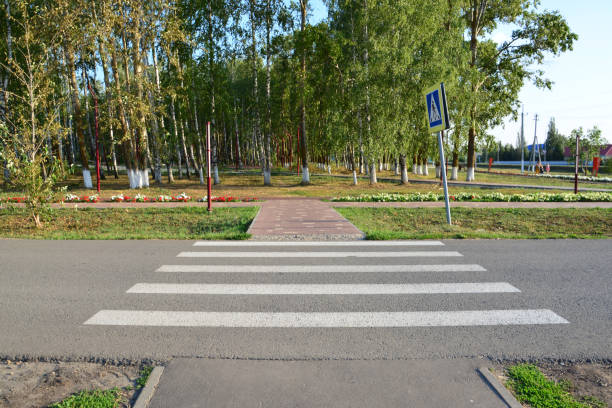 istock a pedestrian crossing with a sign that says crosswalk 2173520428