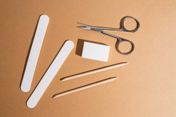 istock Manicure and pedicure tools composition, flat lay. Nail polish, file, scissors. Professional nail care equipment. Beauty care concept 2173523022