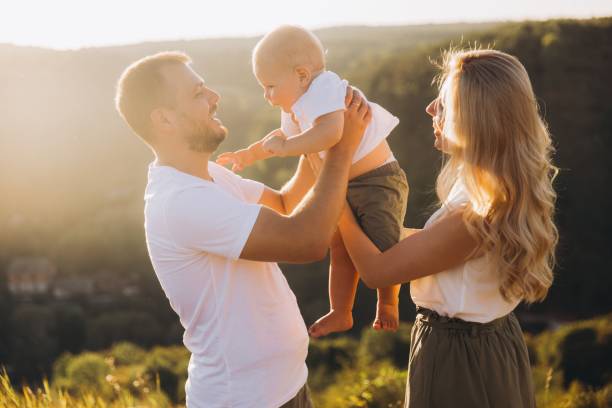 istock Happy Family Enjoying Quality Time Outdoors During Sunset 2173534022